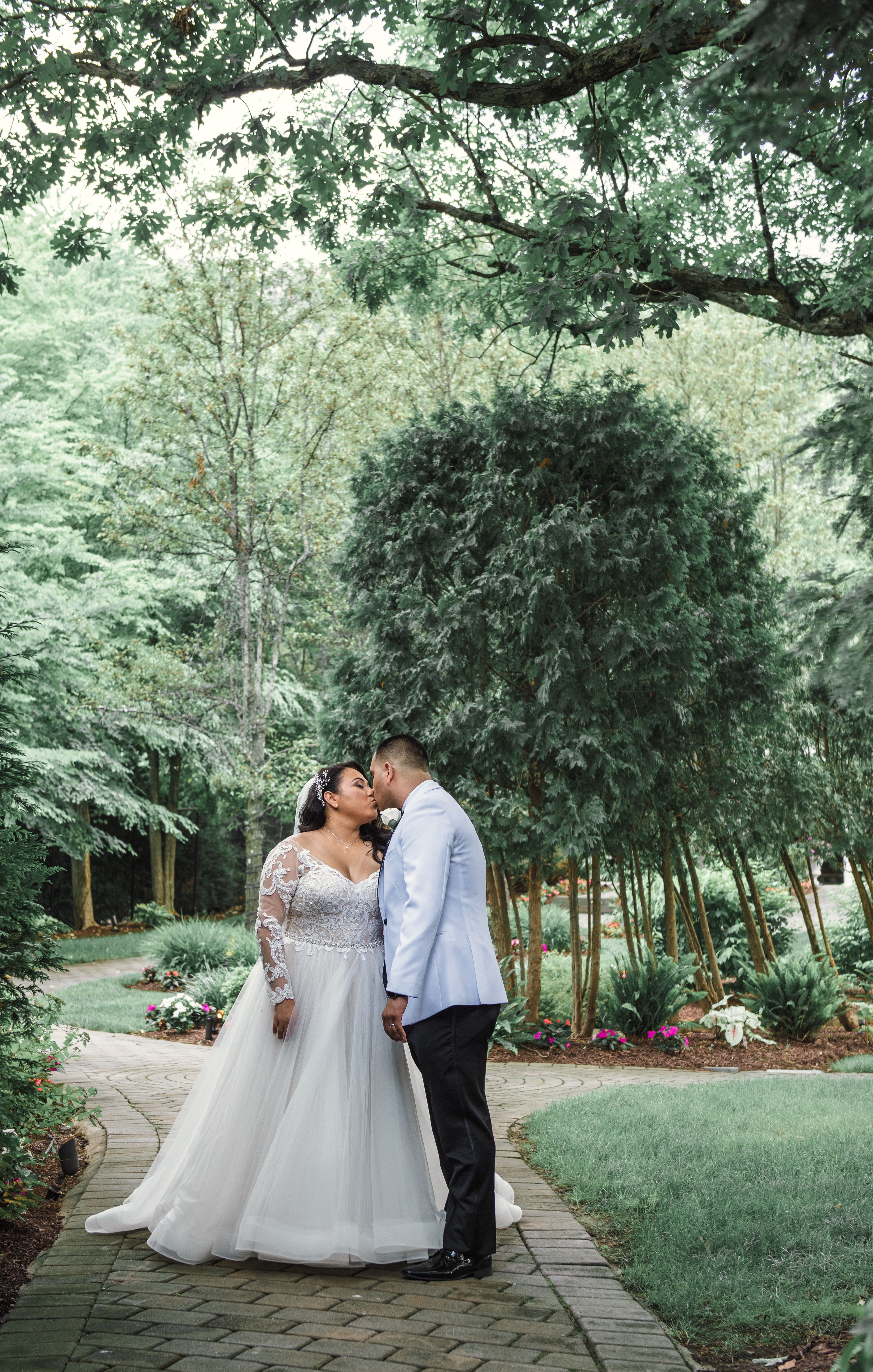 A couple holding hands in a field